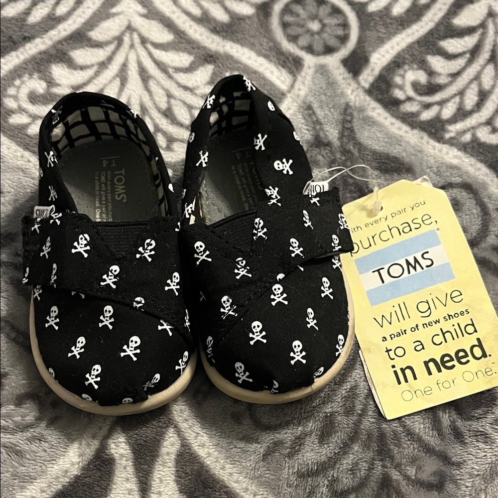 TOMS Kids Black and White Skull Sneakers
